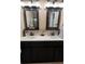 Double vanity bathroom with updated lighting and mirrors at 3234 Bonnybrook S Dr, Lakeland, FL 33811