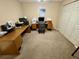 Bright home office features built-in shelving and ample workspace at 3234 Bonnybrook S Dr, Lakeland, FL 33811