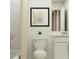 Simple bathroom with white vanity, toilet and shower/tub combo at 5264 Dagenham Dr, Davenport, FL 33837