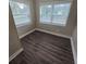 Bright office space with neutral walls and wood-look flooring at 1124 Sunshine Ave, Leesburg, FL 34748