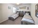 Nautically themed bedroom with twin beds and built-in storage at 2436 Chateau Loop, Kissimmee, FL 34741