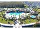 Resort-style community pool with expansive deck and lounge area at 2436 Chateau Loop, Kissimmee, FL 34741