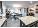 Modern kitchen with dark cabinets and a large island at 2436 Chateau Loop, Kissimmee, FL 34741
