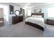 Spacious main bedroom with carpeted floors and plenty of natural light at 2436 Chateau Loop, Kissimmee, FL 34741