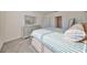 Bright bedroom with a queen-size bed and built-in dresser at 3692 Diving Dove Ln, Bartow, FL 33830