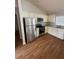 Modern kitchen features stainless steel appliances and light-colored cabinets at 2294 Trailwinds Ter, The Villages, FL 32162