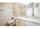 Clean bathroom with white vanity, granite countertop, and updated toilet at 2294 Trailwinds Ter, The Villages, FL 32162