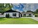 Stunning ranch-style home with a well-manicured lawn at 1646 Center St, Deland, FL 32720