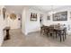 Dining area with a wood table and six chairs at 426 Cheeota Ct, Minneola, FL 34715