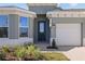 Modern front door with sidelights and a welcoming entryway at 10540 Sw 49Th Avenue Rd, Ocala, FL 34476