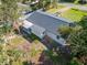 Aerial view of the house and backyard with a pergola at 2302 Broadway St, Lakeland, FL 33801