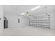 Attached garage with overhead door and ample storage space at 4970 Sw 106Th St, Ocala, FL 34476