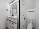Modern bathroom with white vanity and black accents at 716 W 14Th St, Lakeland, FL 33805