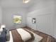 Spacious bedroom with large closet and window, showcasing wood flooring at 716 W 14Th St, Lakeland, FL 33805