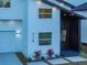 Stylish house exterior with white and dark gray siding, and landscaping at 716 W 14Th St, Lakeland, FL 33805