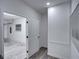 Bright hallway with access to garage and laundry at 716 W 14Th St, Lakeland, FL 33805