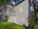Modern house exterior with light gray siding and a landscaped yard at 716 W 14Th St, Lakeland, FL 33805