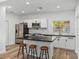 Modern kitchen with stainless steel appliances and an island at 716 W 14Th St, Lakeland, FL 33805