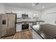 Modern kitchen with stainless steel appliances and dark countertops at 716 W 14Th St, Lakeland, FL 33805