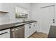 Modern kitchen with stainless steel dishwasher and sink at 716 W 14Th St, Lakeland, FL 33805