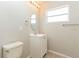 Clean bathroom, updated vanity, and oval mirror at 1223 Avenue N, Haines City, FL 33844