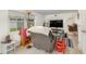 Relaxing bonus room with a recliner, TV, and view of backyard at 132 James St, Auburndale, FL 33823