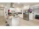 Modern kitchen with stainless steel appliances and granite counters at 132 James St, Auburndale, FL 33823