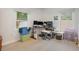 Home office featuring a workspace with two monitors and ample natural light at 132 James St, Auburndale, FL 33823
