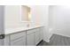 Clean bathroom with white cabinets and a tiled shower/tub combo at 13486 Leaping Water Way, Astatula, FL 34705