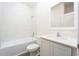 Bathroom with white subway tile and a clean, modern aesthetic at 13486 Leaping Water Way, Astatula, FL 34705