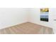Well-lit bedroom with neutral wall colors and carpeted flooring at 13486 Leaping Water Way, Astatula, FL 34705