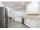 Modern kitchen featuring granite countertops and stainless steel appliances at 13486 Leaping Water Way, Astatula, FL 34705