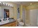 Clean bathroom with a shower/tub combo and vanity at 1111 Royal Ridge Dr, Davenport, FL 33896