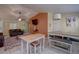 Dining area with a wooden table and bench seating at 1111 Royal Ridge Dr, Davenport, FL 33896