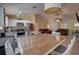 Kitchen with stainless steel appliances and a dining area at 1111 Royal Ridge Dr, Davenport, FL 33896