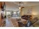 Open concept living room with adjacent kitchen and dining area at 1111 Royal Ridge Dr, Davenport, FL 33896