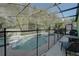 Screened-in pool area with patio furniture at 1111 Royal Ridge Dr, Davenport, FL 33896