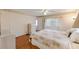 Bedroom with wood flooring, dresser and window with coverings at 1610 Reynolds Rd # 159, Lakeland, FL 33801