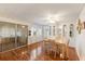 Bright dining room features wood flooring and built-in hutch at 1610 Reynolds Rd # 159, Lakeland, FL 33801
