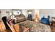 Spacious living room with ample seating and hardwood floors at 1610 Reynolds Rd # 159, Lakeland, FL 33801