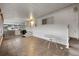 Screened porch with tiled floor and small table at 1610 Reynolds Rd # 159, Lakeland, FL 33801