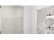 Modern bathroom with double vanity and circular mirrors at 1312 Congo Dr, Poinciana, FL 34759
