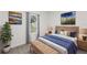 Spacious bedroom with a wooden bed frame, blue bedding, and natural light at 1312 Congo Dr, Poinciana, FL 34759