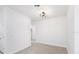 Clean and bright hallway with tile flooring and neutral color palette at 1312 Congo Dr, Poinciana, FL 34759