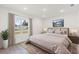 Spacious primary bedroom with plush bedding and large window at 1312 Congo Dr, Poinciana, FL 34759