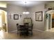 Dining room with tile floors, a round table, and a hutch at 2196 Kershaw Rd, The Villages, FL 32162