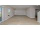 Spacious living room with light wood flooring at 1426 Sea Glass Rd, Haines City, FL 33844