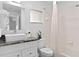 Clean bathroom with white vanity, granite countertop, and shower/tub combo at 2622 Montego Bay Blvd, Kissimmee, FL 34746