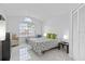 Spacious bedroom with a king-size bed and marble flooring at 2622 Montego Bay Blvd, Kissimmee, FL 34746