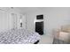 Bright bedroom featuring a comfortable bed and plenty of closet space at 2622 Montego Bay Blvd, Kissimmee, FL 34746